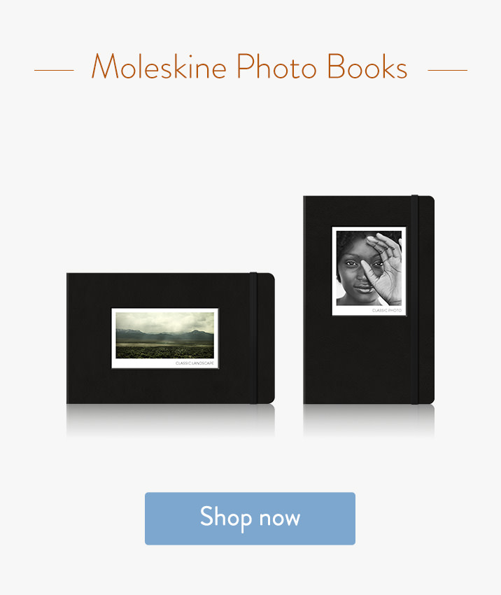 Two Moleskine photo books with portrait and landscape photography.