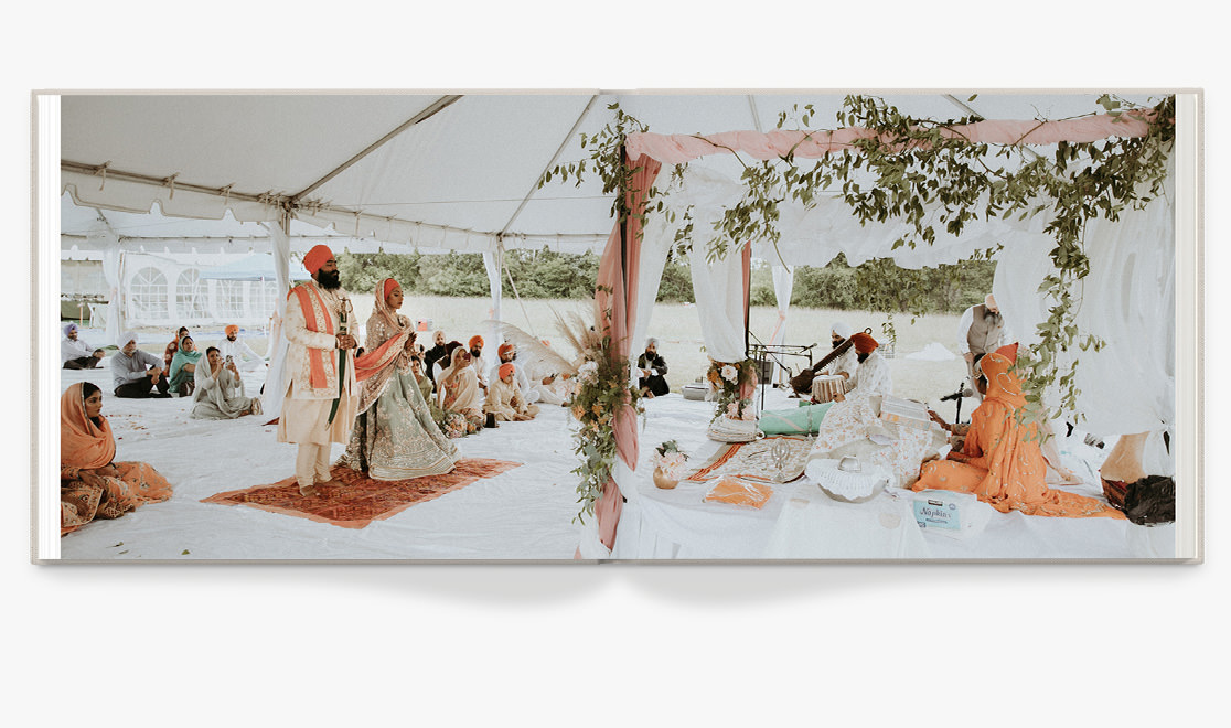 Open Wedding Photo Album showing double page photo