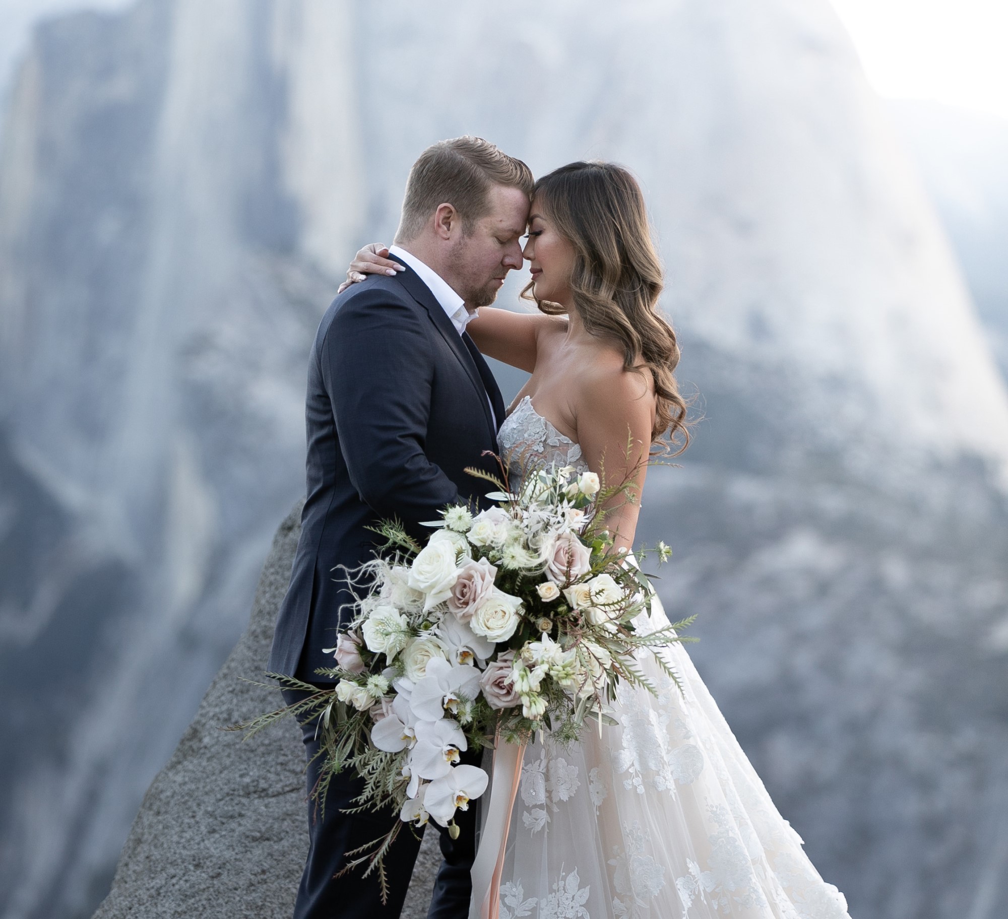 Bride and groom embrace