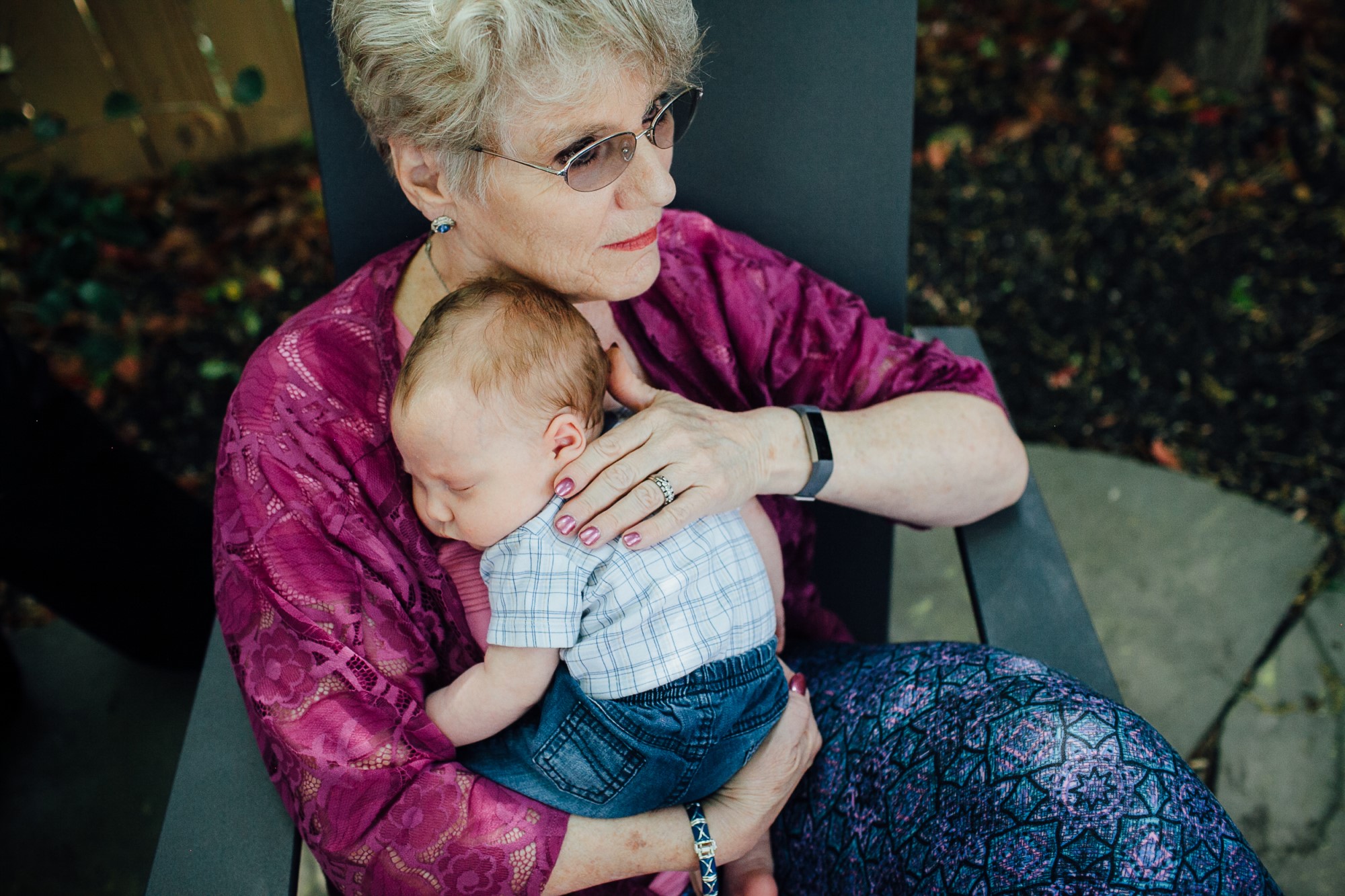 Grandmother holding grandchild
