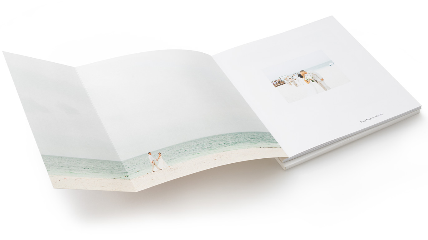 Luxe Softcover Photo Book open with wedding images