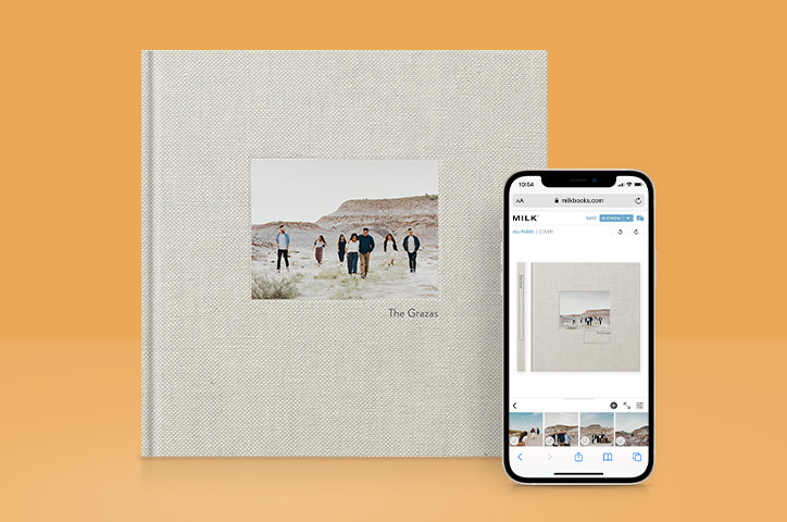 MILK Premium Photo Book and smartphone