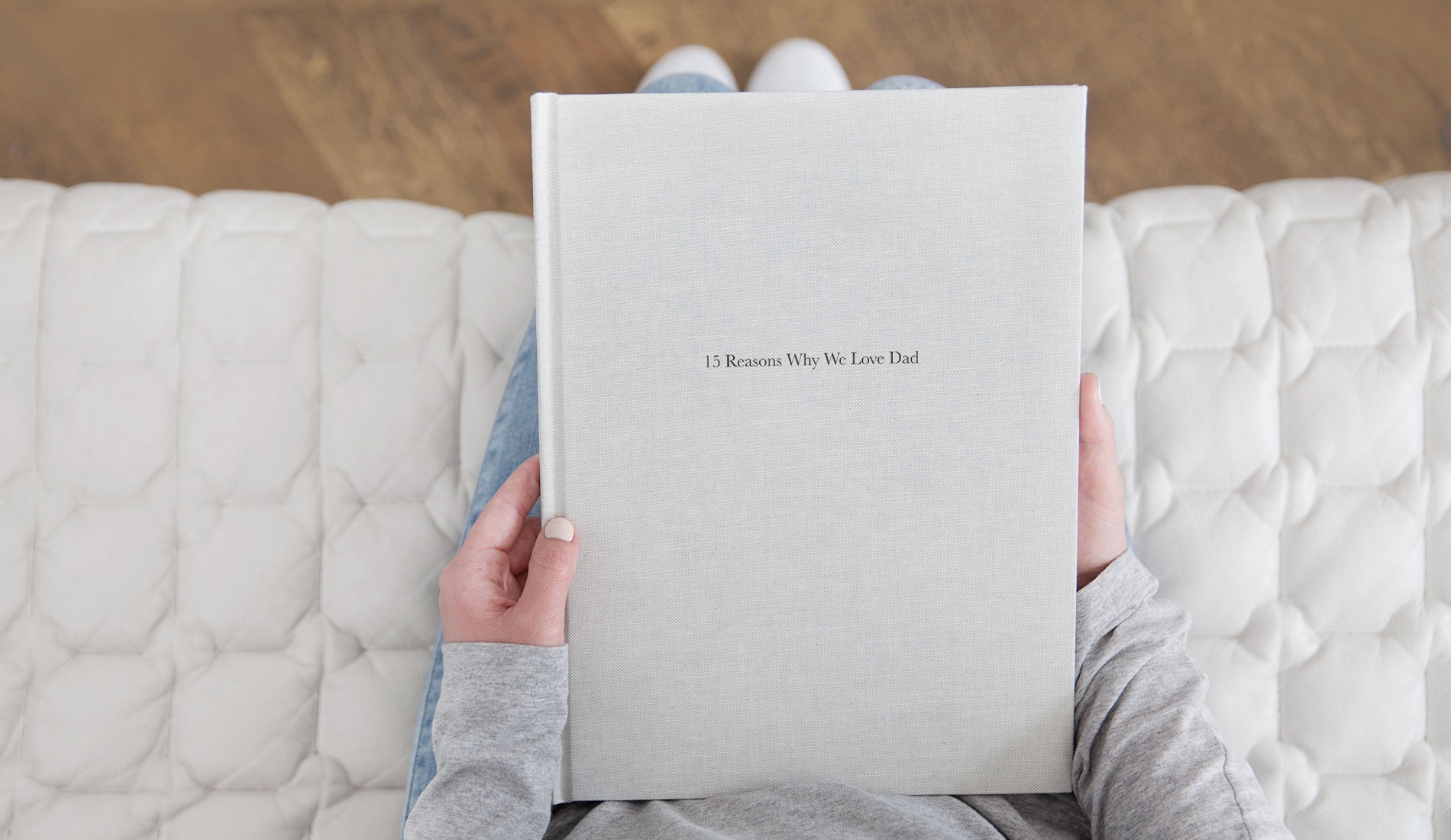 Photo book with cover text 15 Reasons Why We Love Dad
