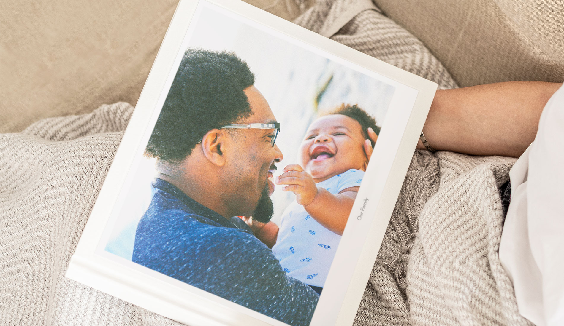 Father's day photo book with cover image of father and baby