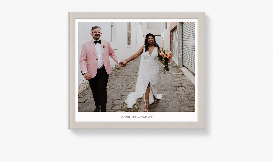 Photo book with cover image of wedding photo