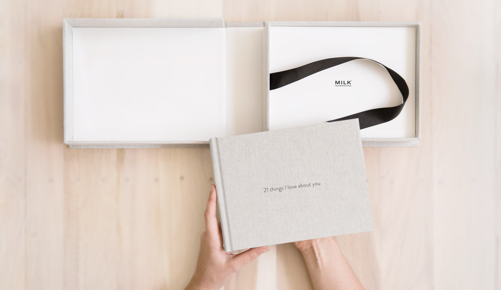 Presentation box and a premium photo book with cover text '21 things I love about you'