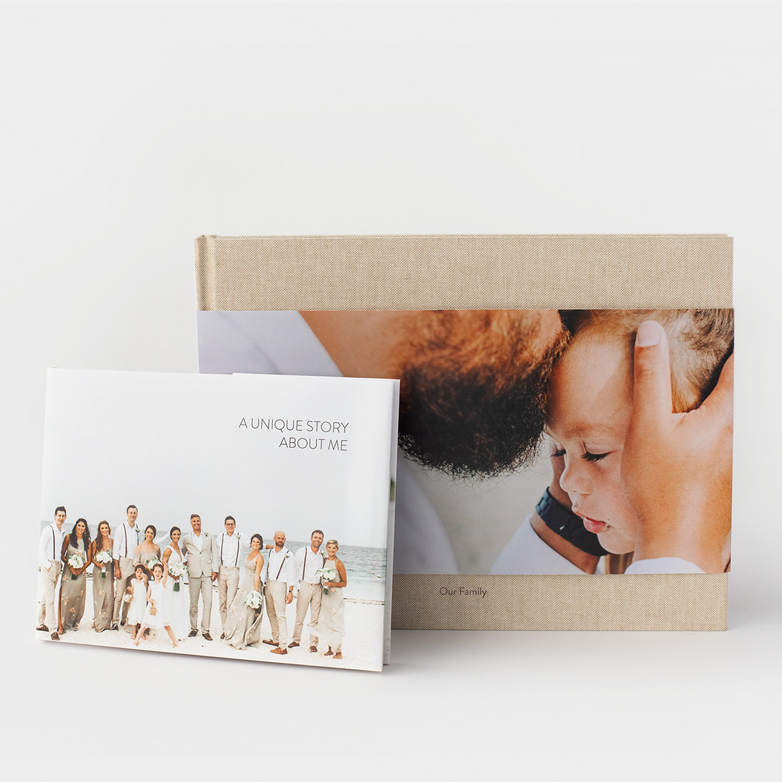 Two landscape Premium Photo Books with jackets on each - one full, one partial
