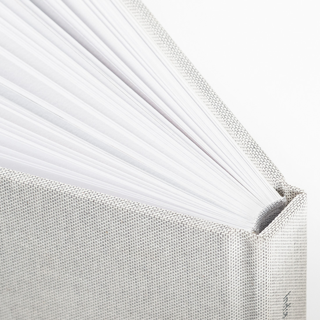 Close up showing pages of partially open photo book