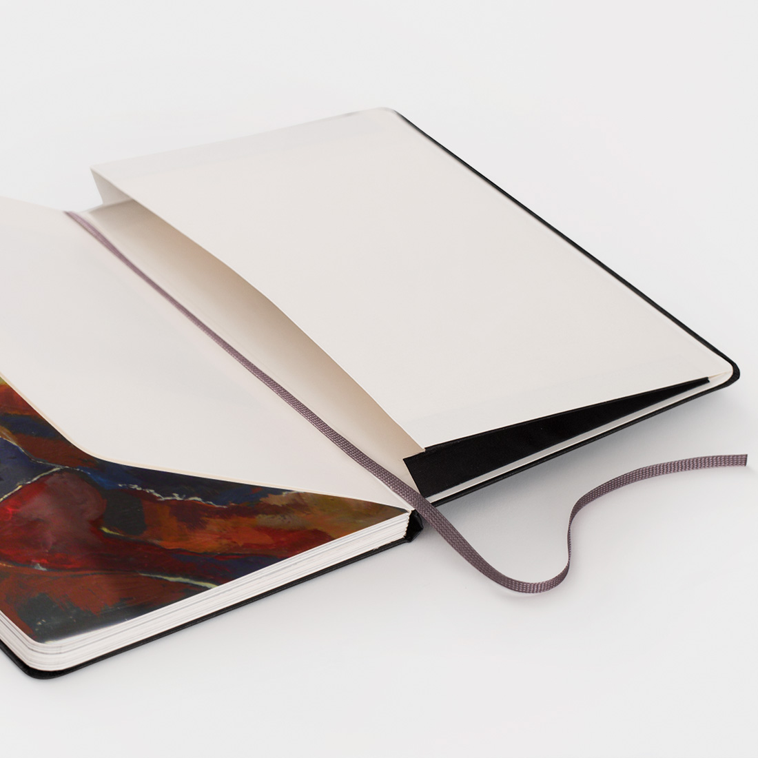 Geöffnetes Moleskine-Fotobuch.