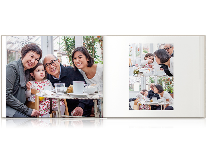 Open Photo Book with spread of family portraits