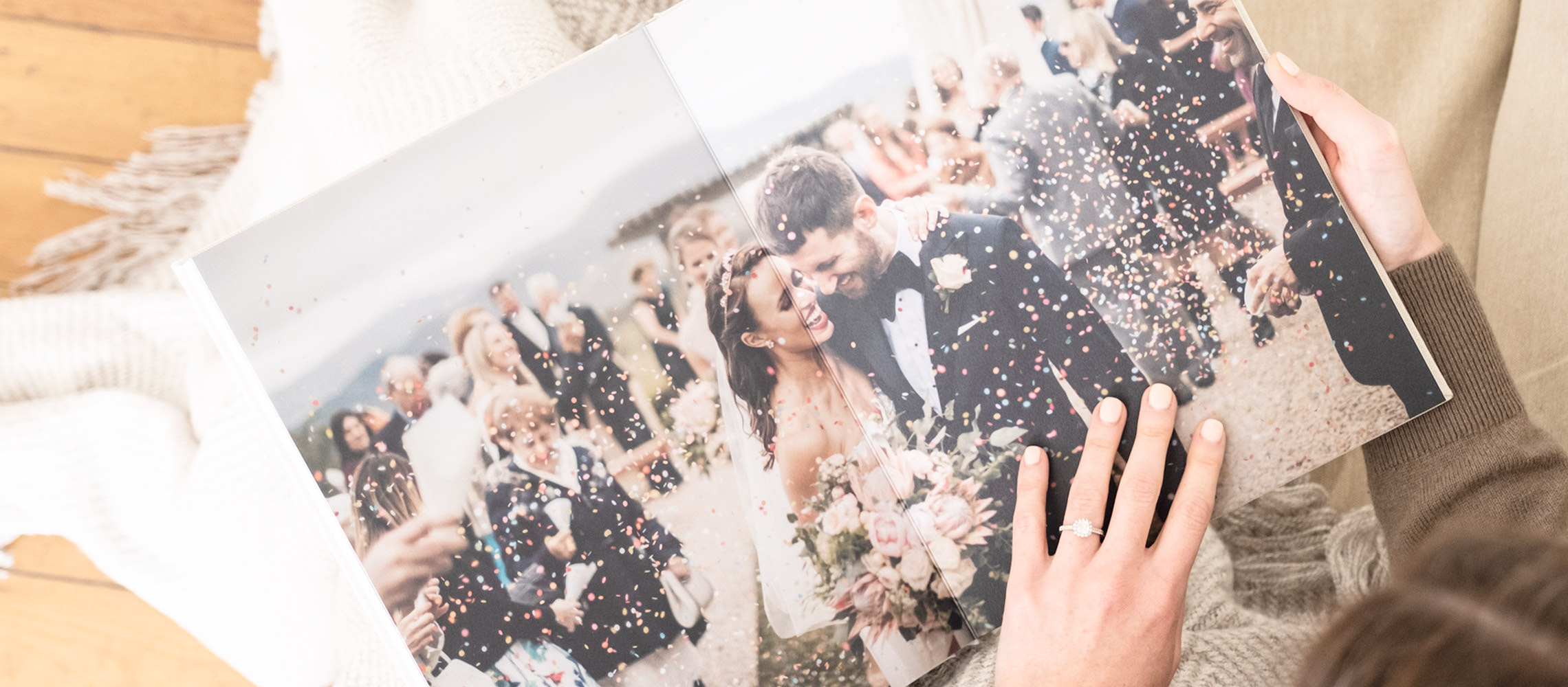 Woman holding portrait wedding photo album