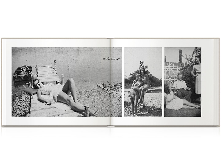 Open photo book showing spread of black and white photos
