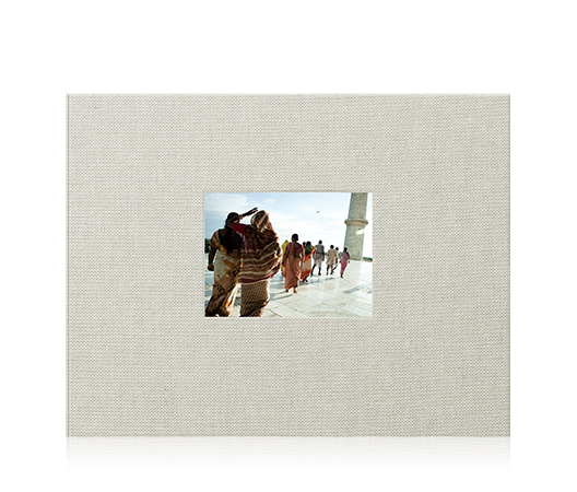 Álbum de fotos de alta calidad en formato apaisado con una foto de viaje en la portada.