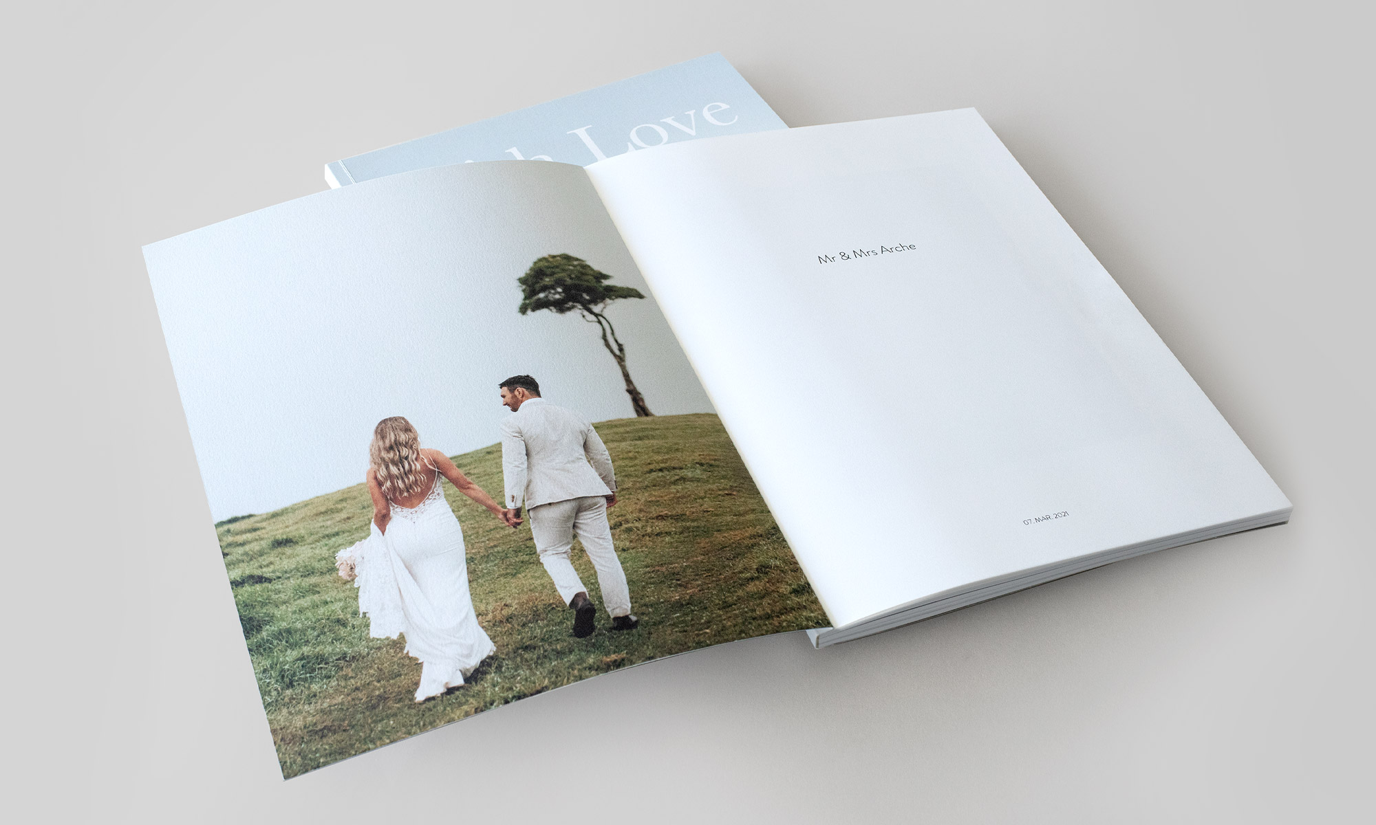 Open MILK wedding magazine showing printed inside cover