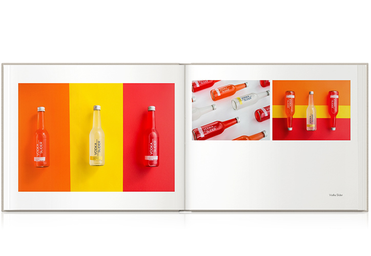 Open photo book showing product imagery