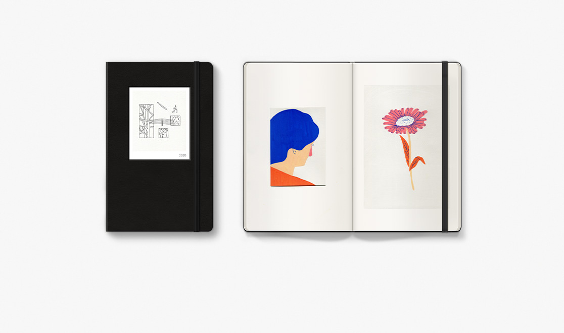 Open Moleskine portfolio showing art pieces