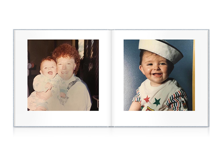 Open Photo Book showing spread of baby photos