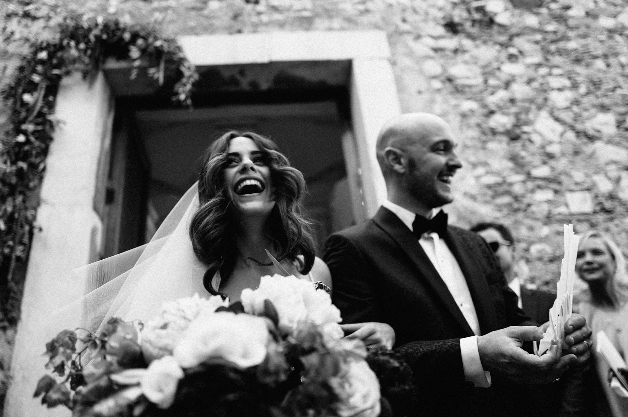 Bride and groom leaving church
