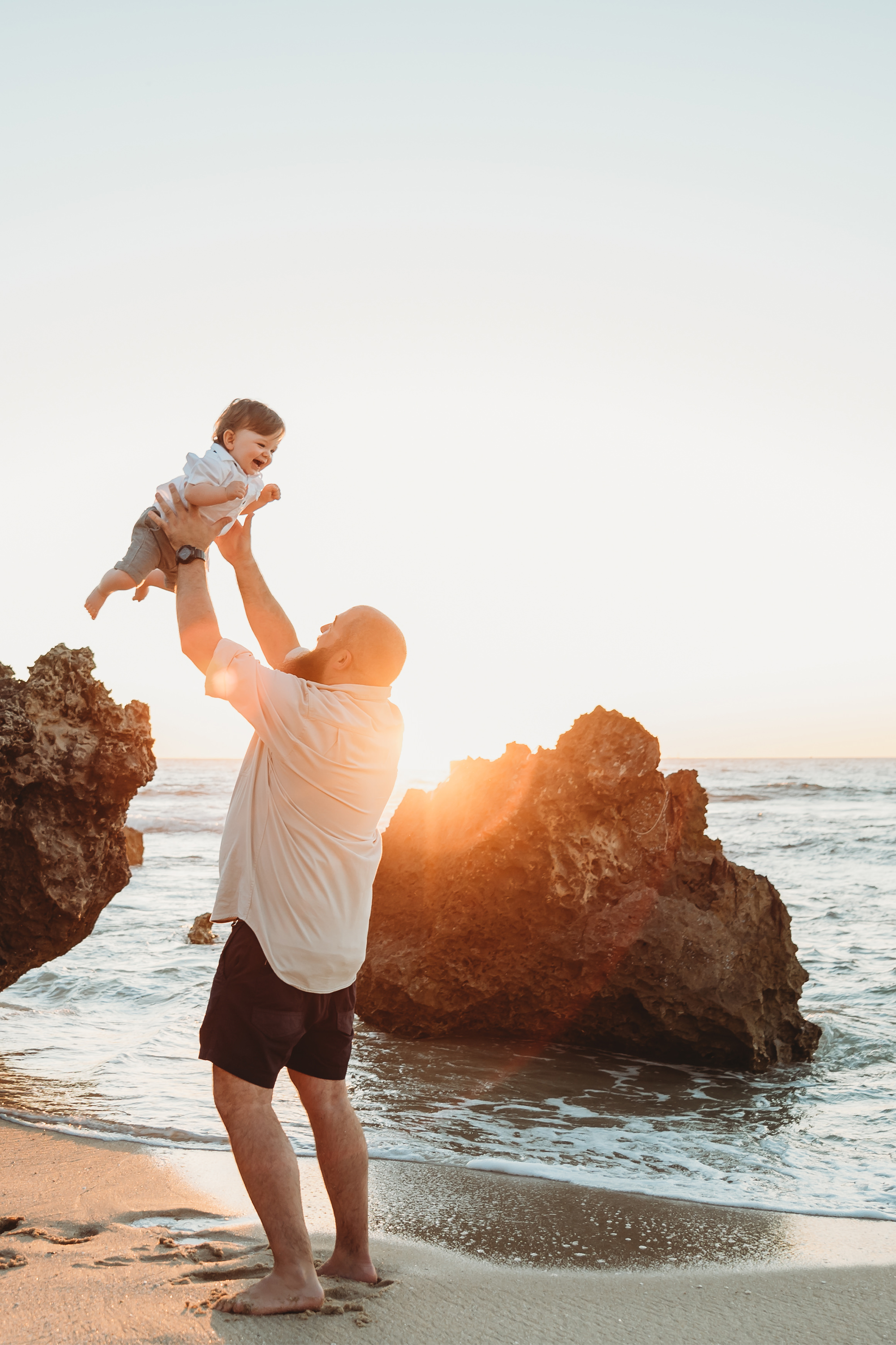 Man with child on bridge