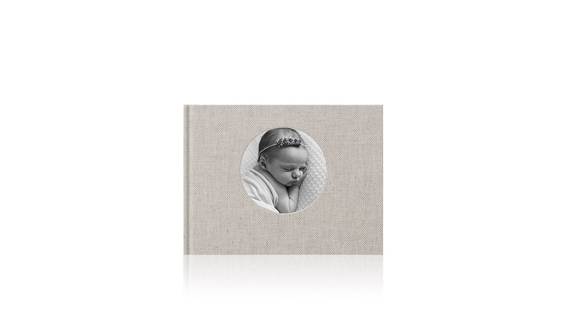 Premium landscape photo book with baby on the cover.