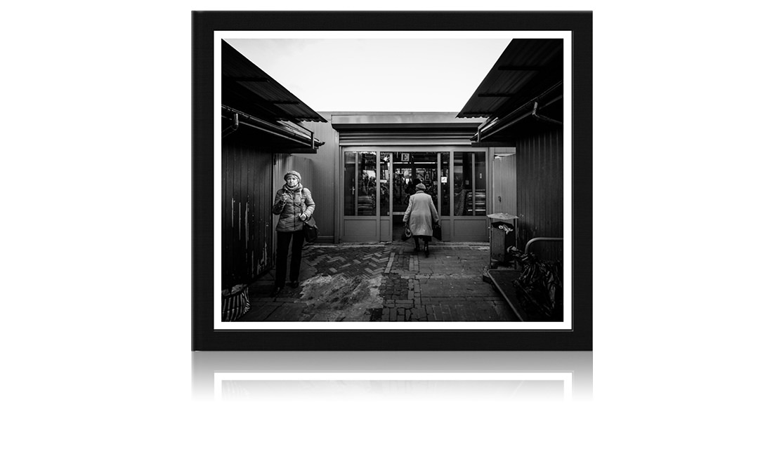 Photo book with black and white street photography image on cover.