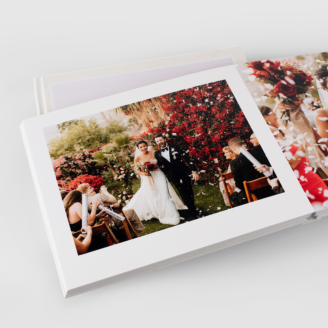Vibrant wedding image on board page of album