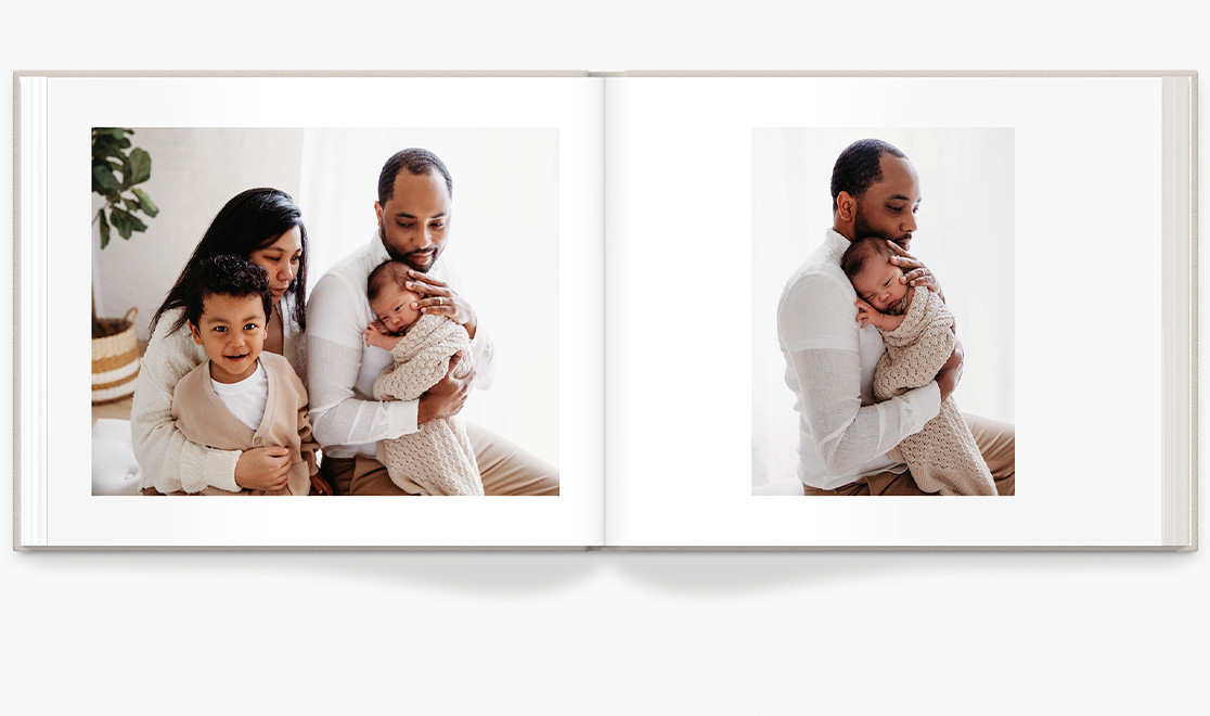 Double page book spread showing family pictures