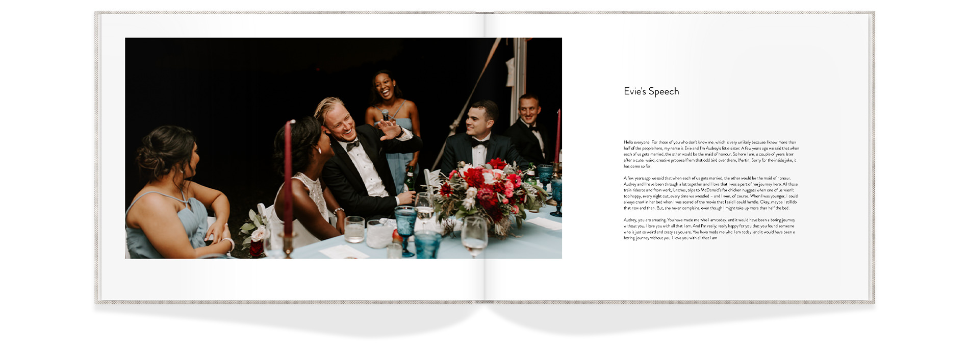 Newlywed couple enjoying speech by guest