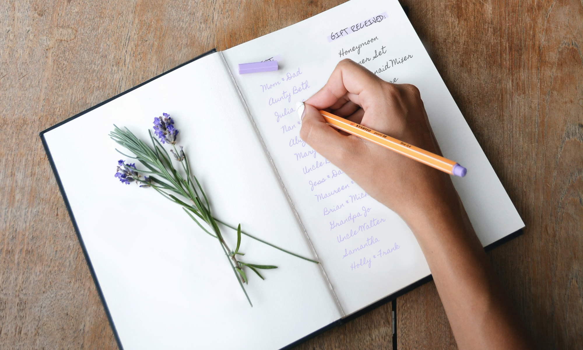 notebook with handwritten wedding guest gift list