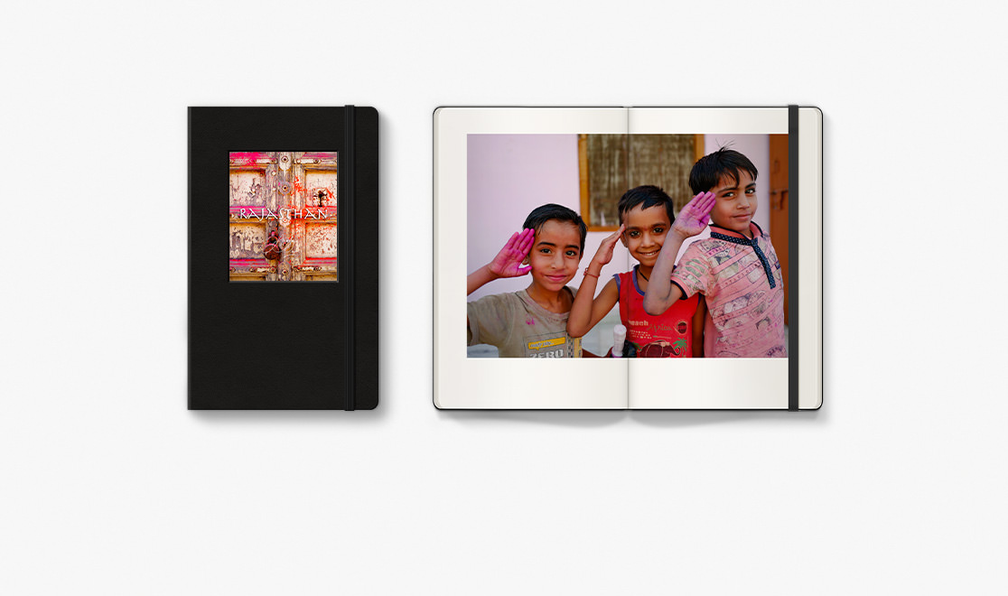 Photo book of three children saluting in Northern India