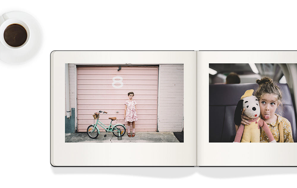 Photo of girl in moleskine photo book