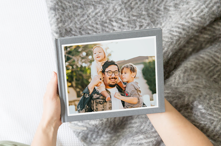 Father and son on photo book