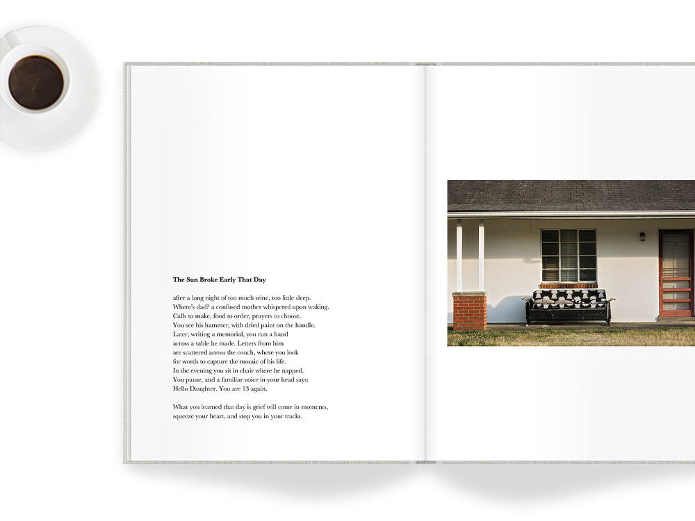Open portrait photo book with poetry and pictures inside of house next to cup of coffee