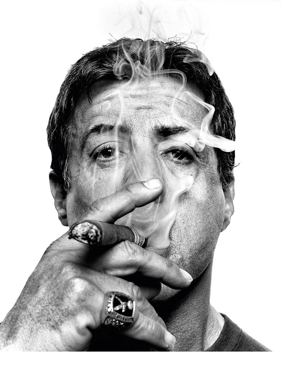 Sylvester Stallone smoking a cigar