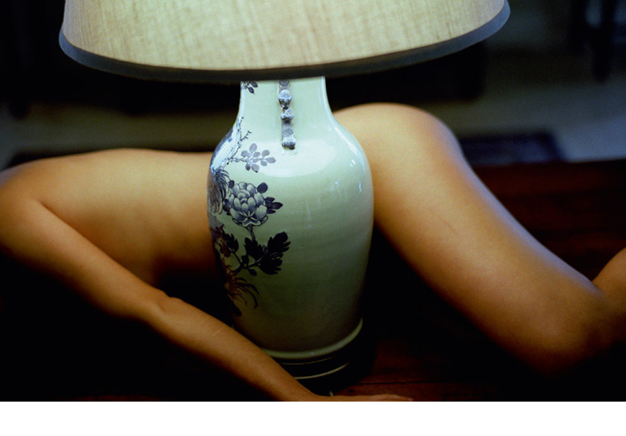 Woman lying by lamp - Untitled, 2007.
