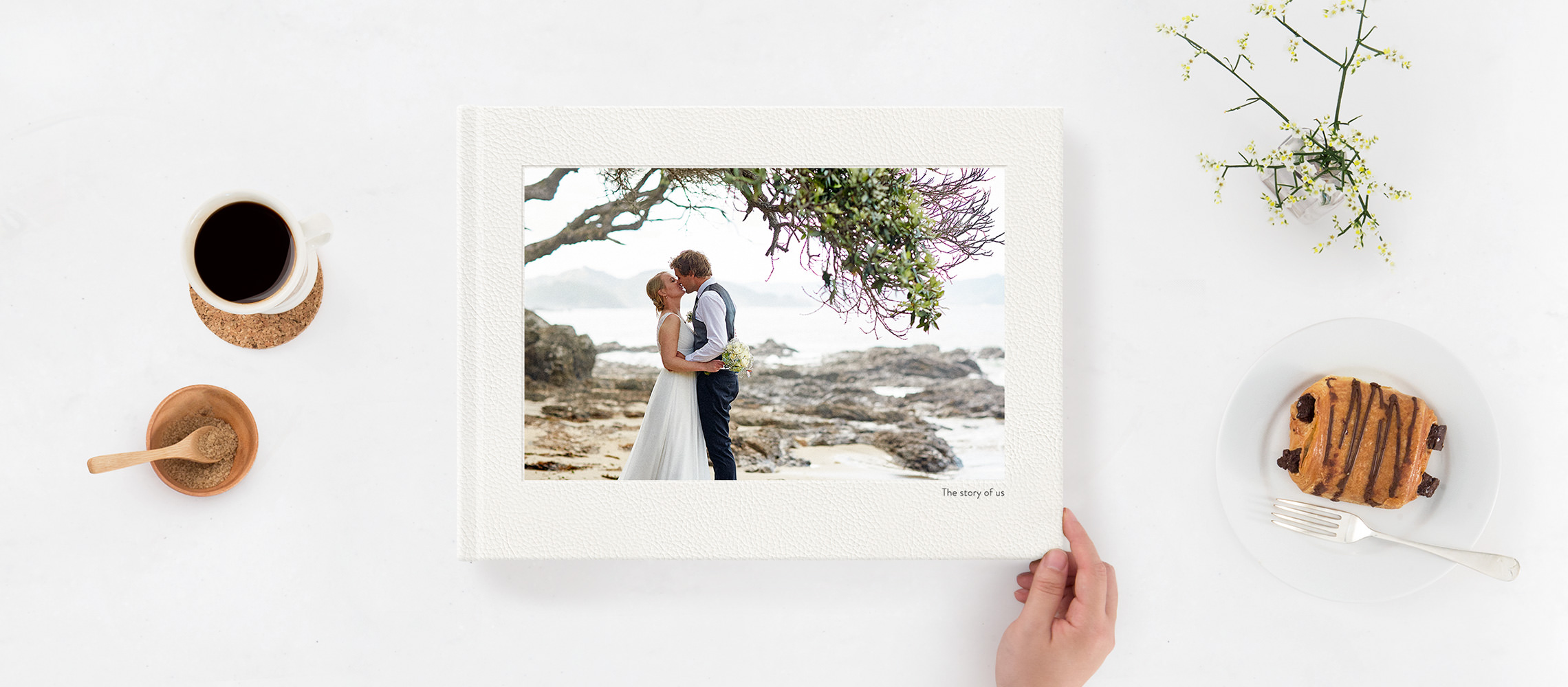 Wedding Photo Album with cover image of bride and groom kissing on beach