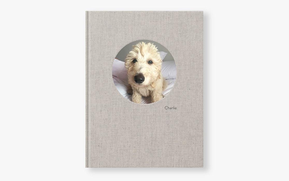 Photo book with dog on the cover.