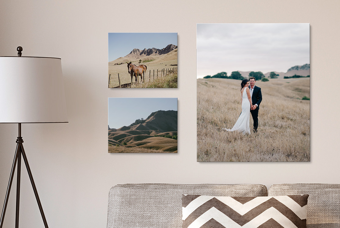 Three canvas prints with photos from wedding day.