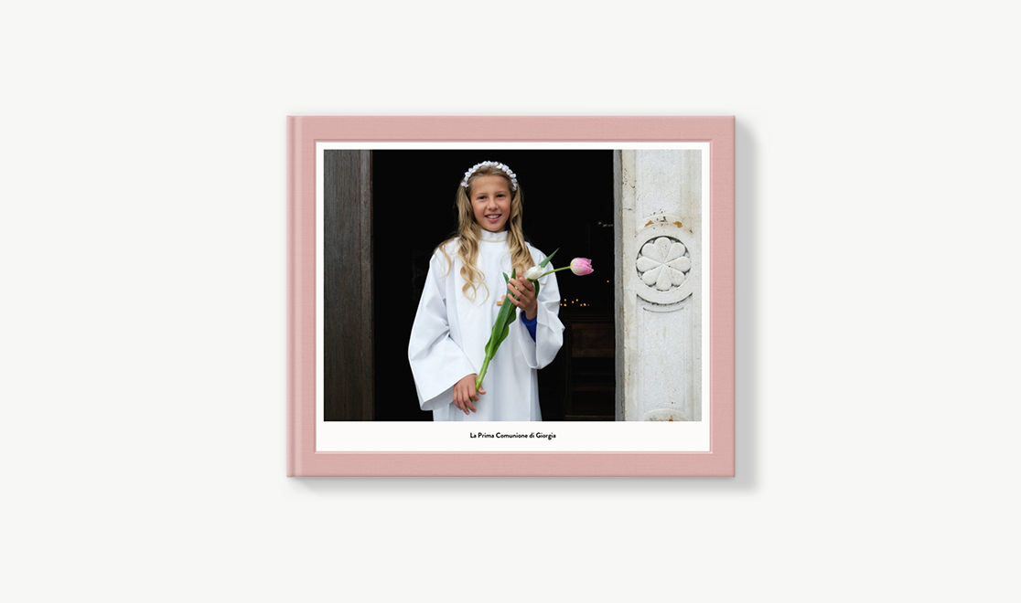 Classic photo book with cover image of young girl at her first communion.