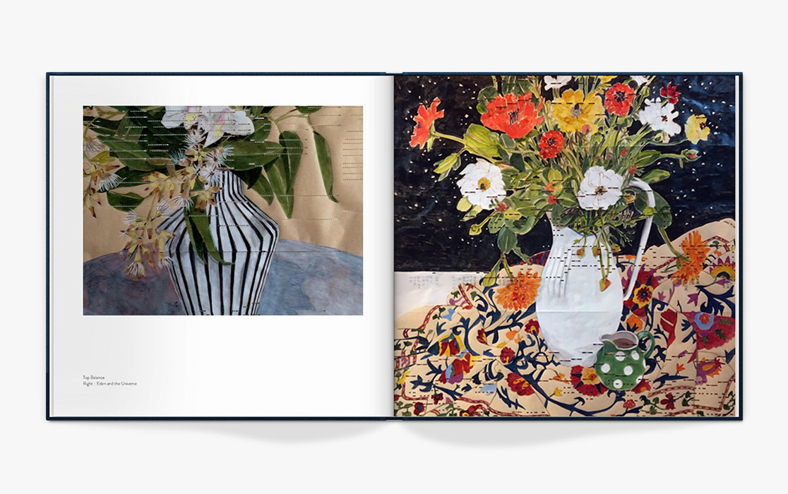 Open photo book with art.