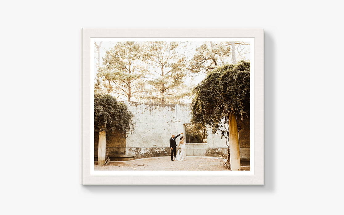 Classic photo book with newlywed couple on the cover.