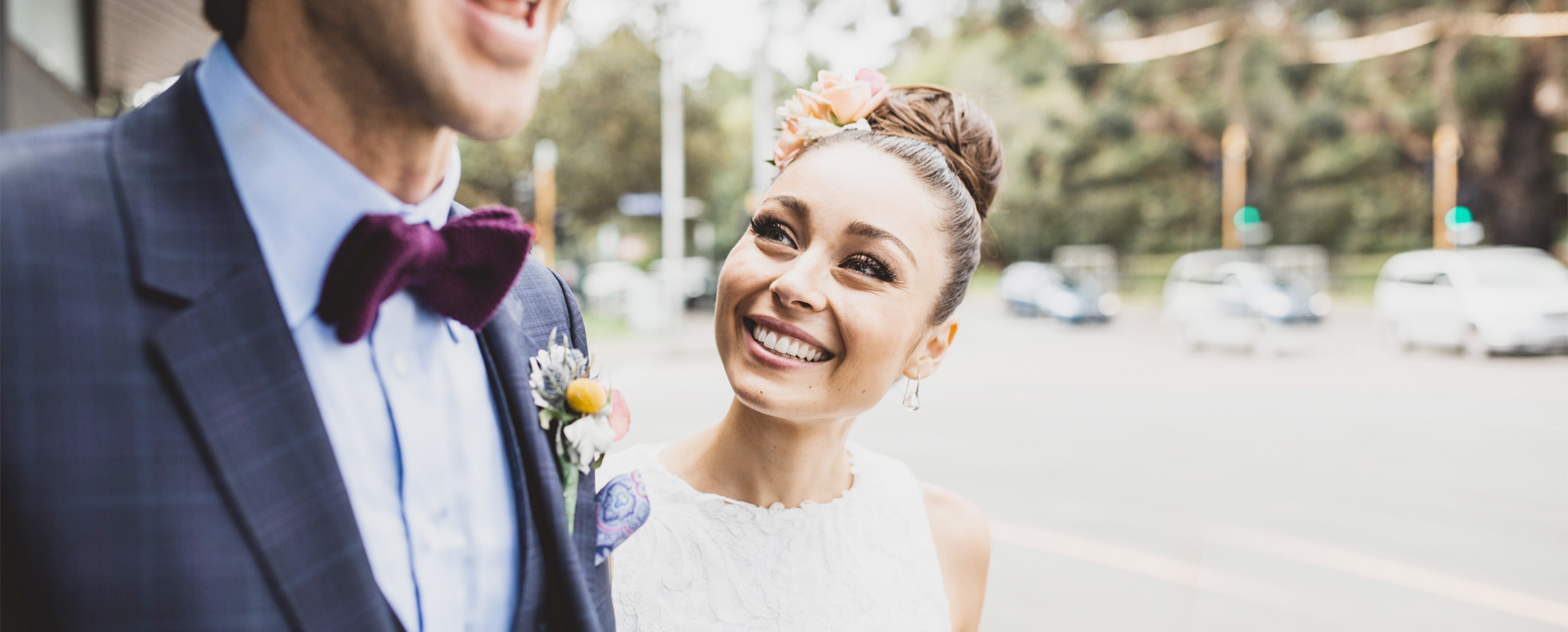 Bride looking at groom laughing.
