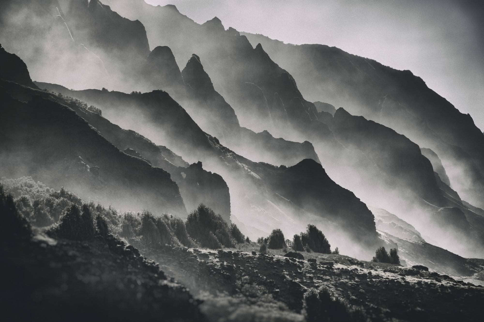 Black and white hilly landscape.