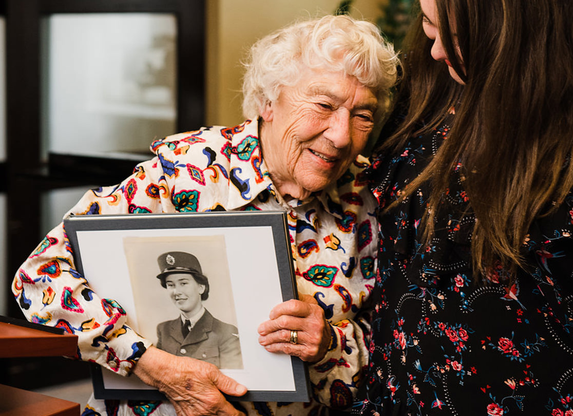 Jean Perdue holding her MILK Photo Book.