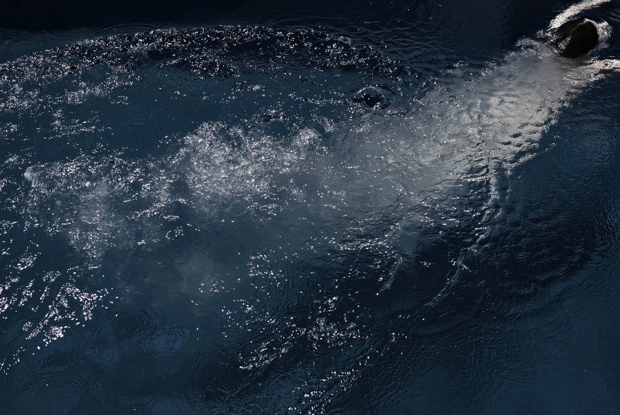 Splash from someone diving in water.