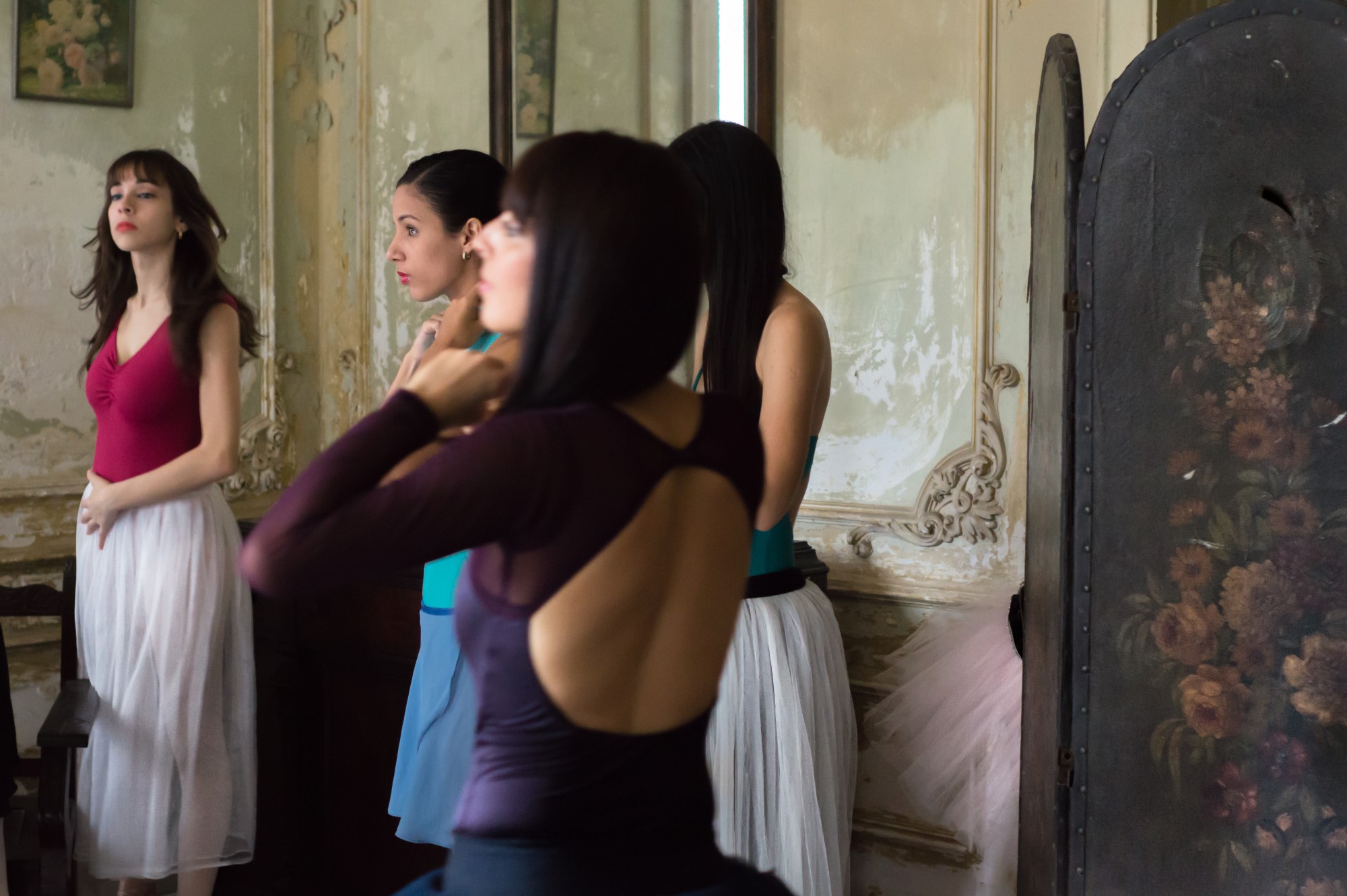 Ballet dancers gathered and un-posed.