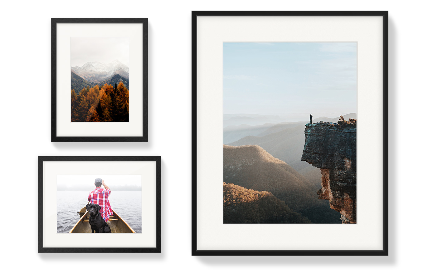 Three gallery frames with adventure photos.