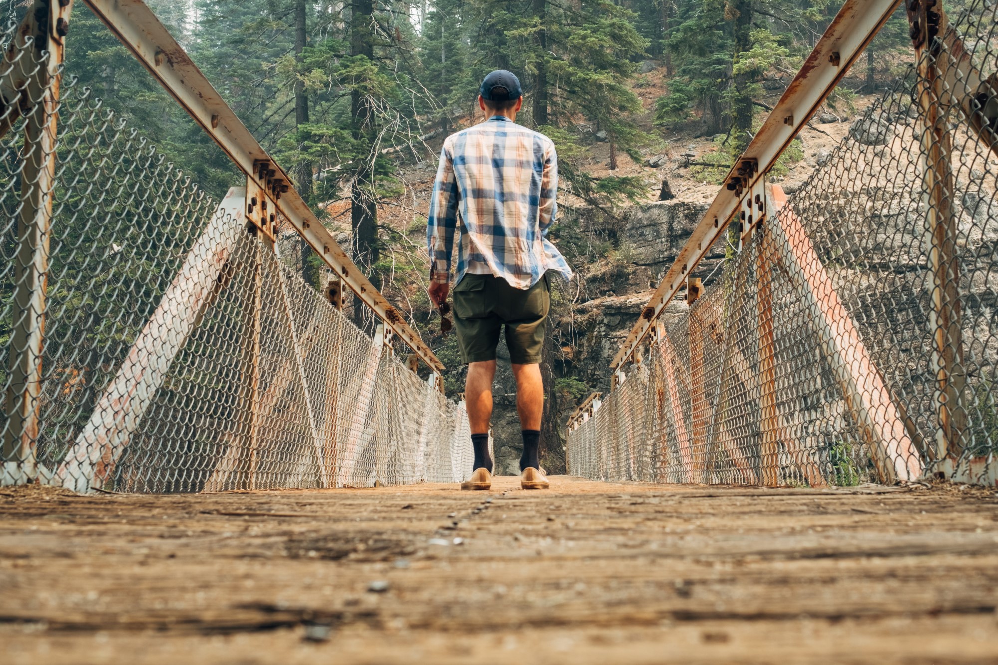 Man on bridge.