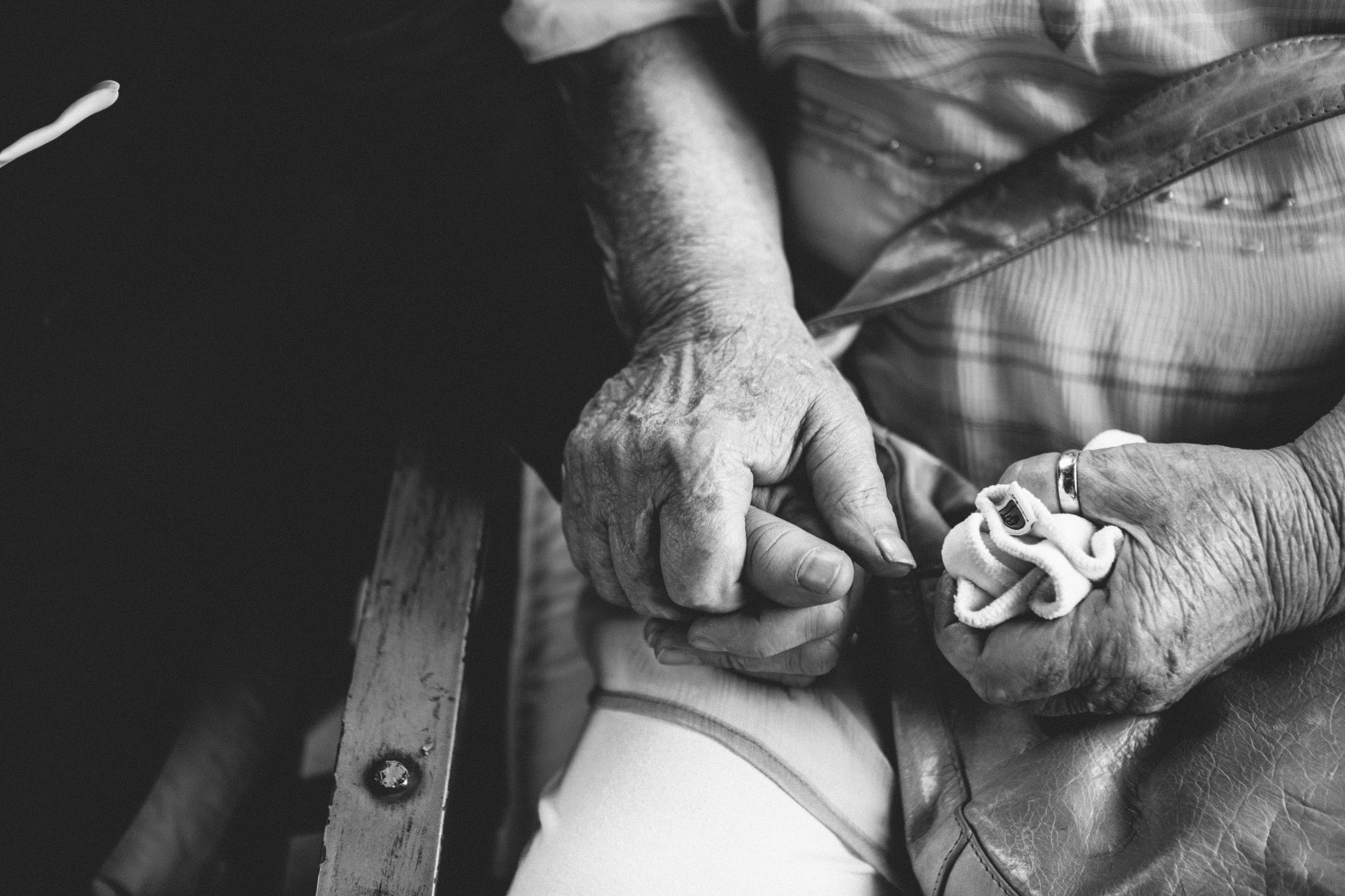 Man holding hands with grandmother