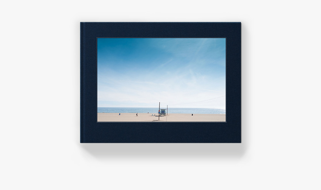 Photo Book with image of beach on sunny day on cover
